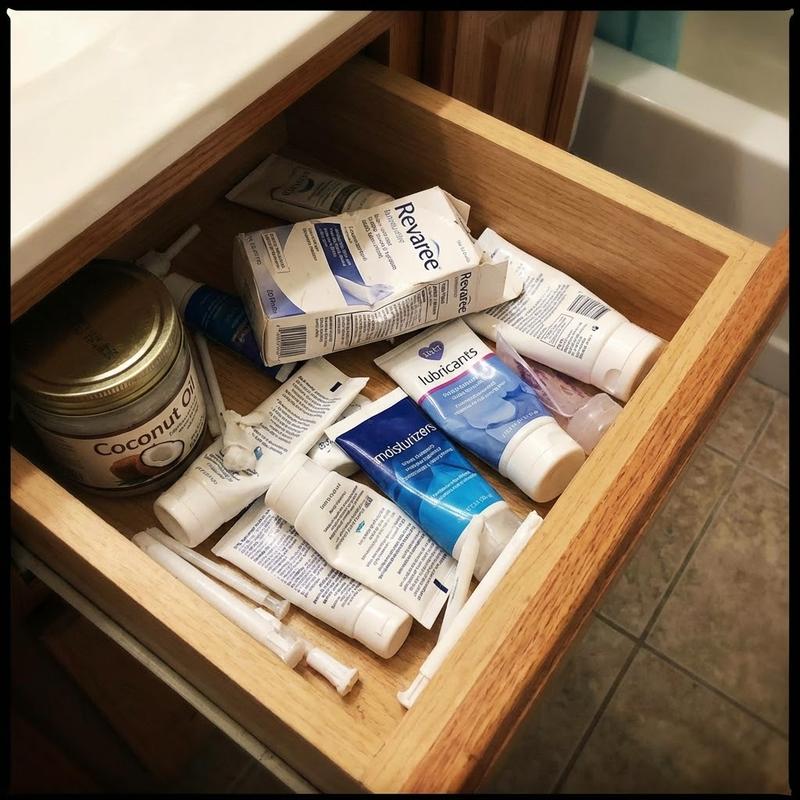 A bathroom drawer full of failed products